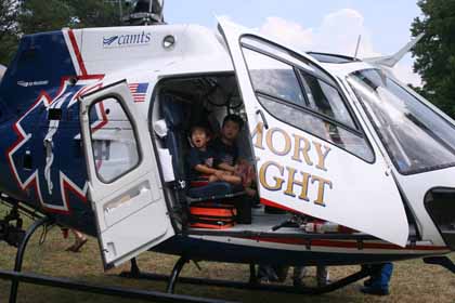 07-04-04 Micah and Sheridan in Heliocopter.jpg